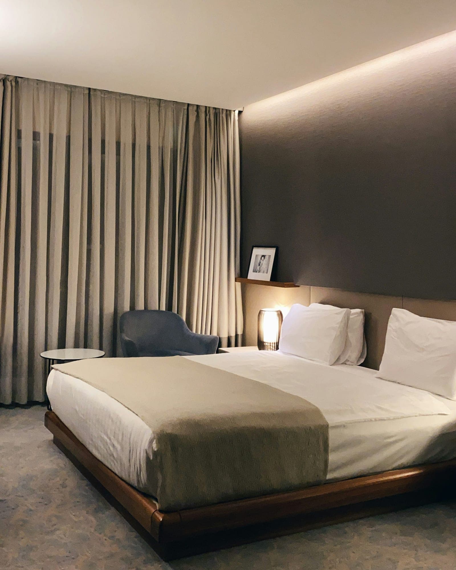 Boutique hotel bedroom with crisp white bedding