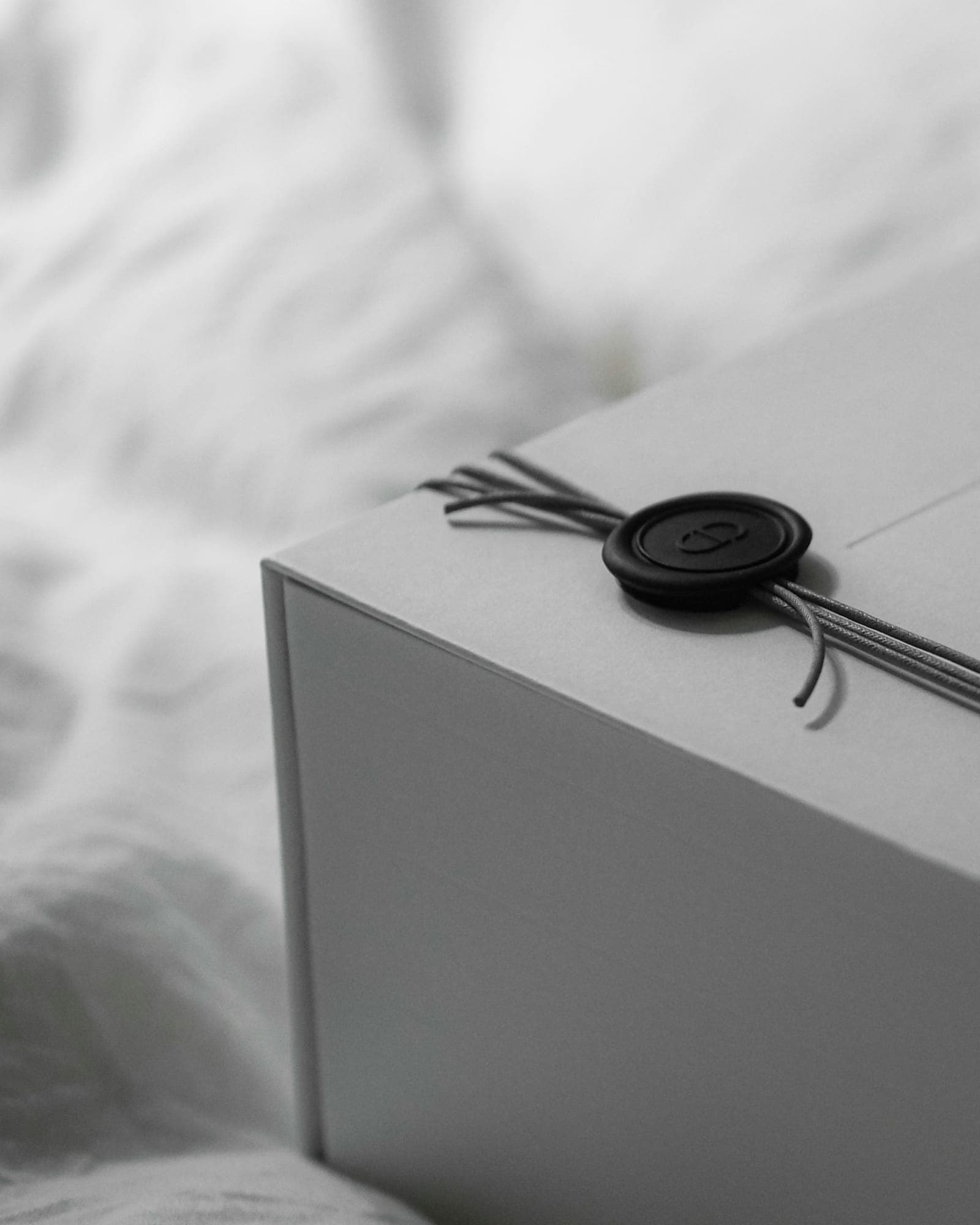 Keepsake gift box sealed with a ribbon and wax seal